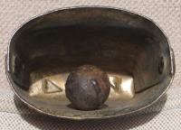 An Underside View of a Blum Cowbell